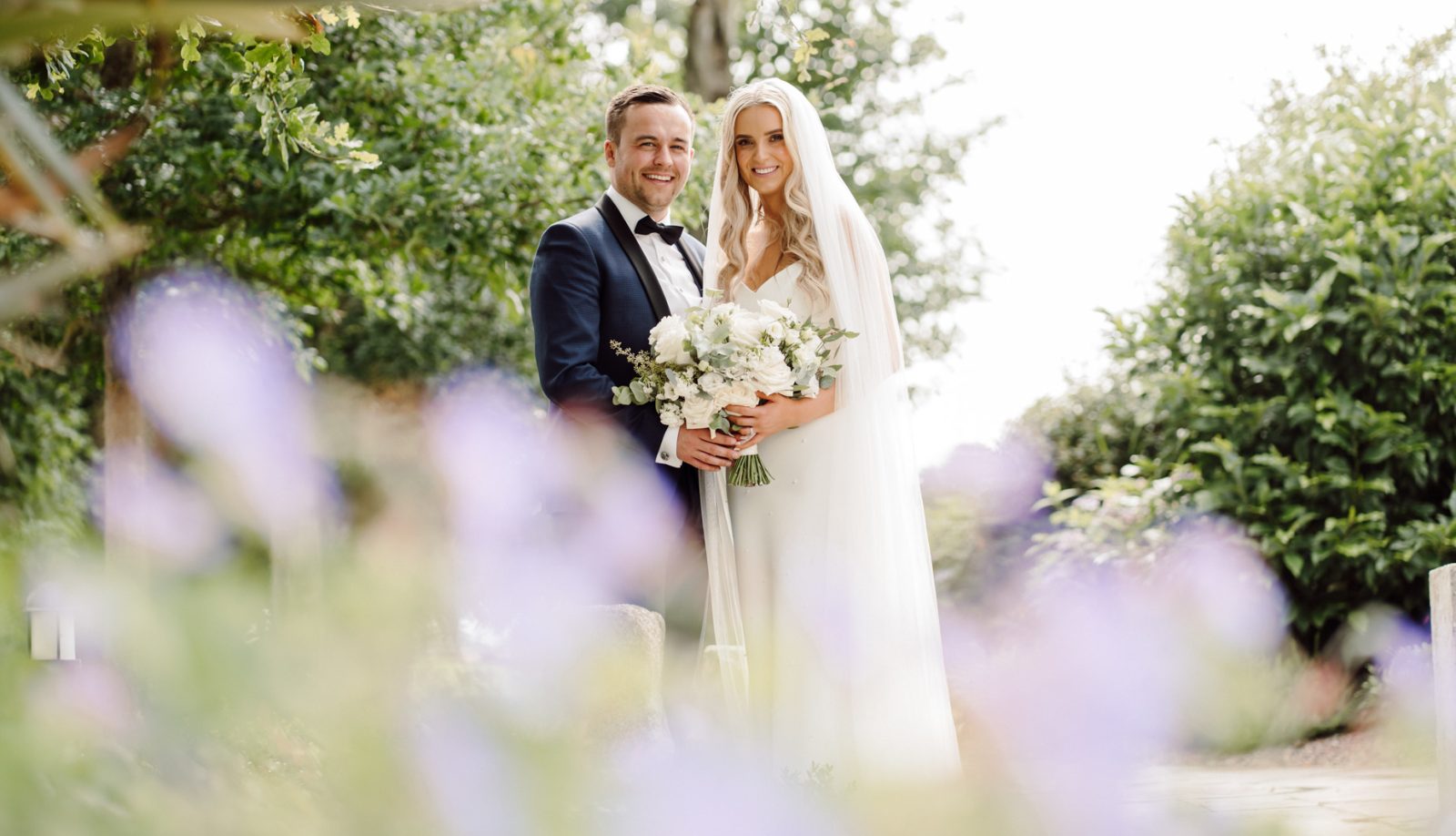 Bride and groom posed at Darver Castle County Lough