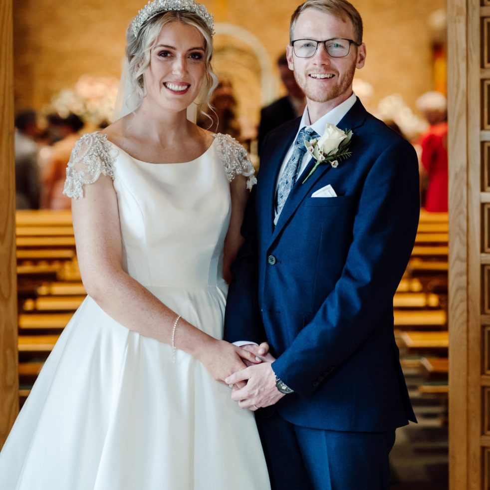 Bride & Groom in Church Doorway on their wedding day